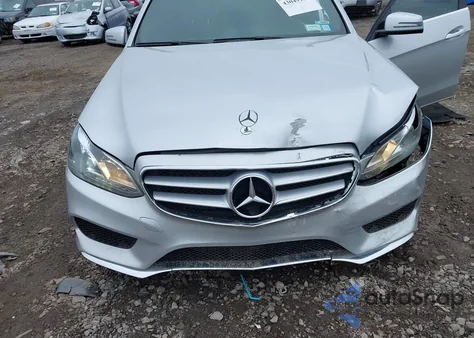 2014 Mercedes-Benz E 350 из США, поврежденный, VIN WDDHF5KB0EB035538